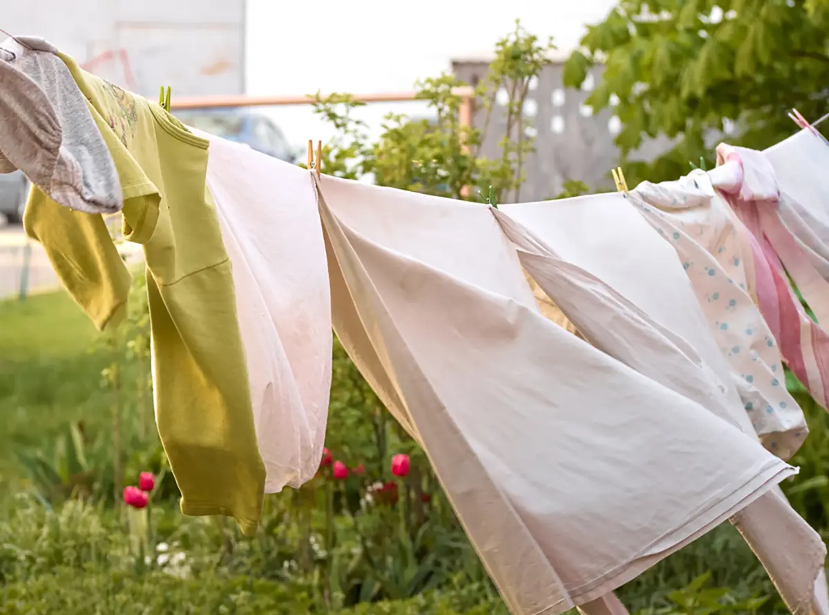 Sunlit clothes drying on an outdoor clothesline